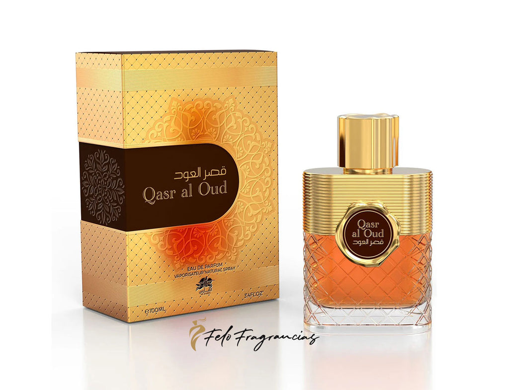 Estuche y frasco de Eau de Parfum Qasr al Oud 100 ml, vidrio ámbar y tapa dorada.