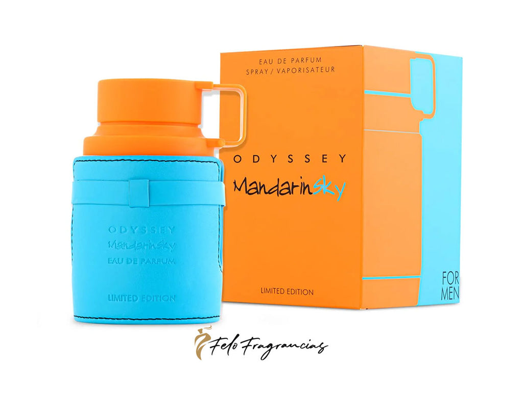 Perfume y estuche Armaf Odyssey Mandarin Sky: frasco azul y caja naranja con asa