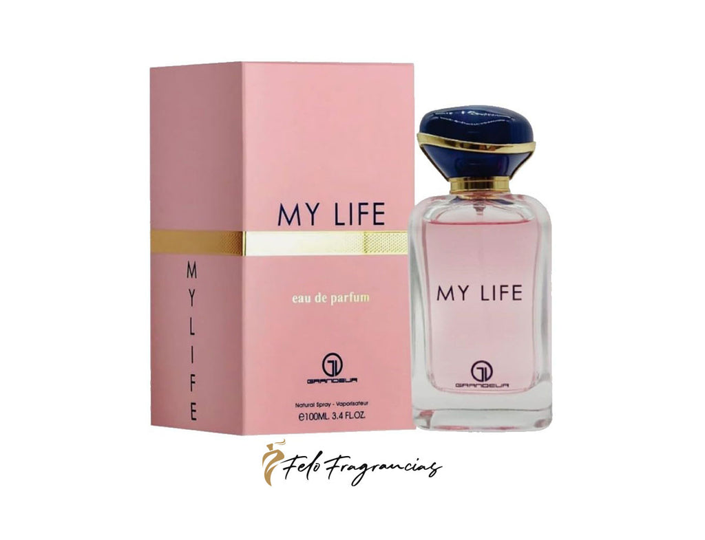 Set de Eau de Parfum My Life: frasco transparente y caja rosa con tapa azul.