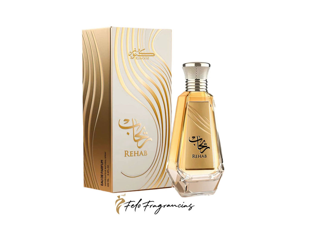 Rehab 100 ml eau de parfum bottle with gold liquid and matching box, hexagonal glass