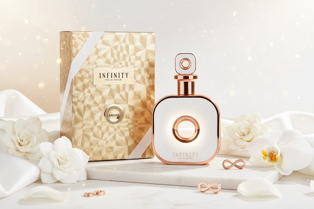 Perfume Armaf Club De Nuit Infinity Gold Eau de Parfum en frasco dorado con caja