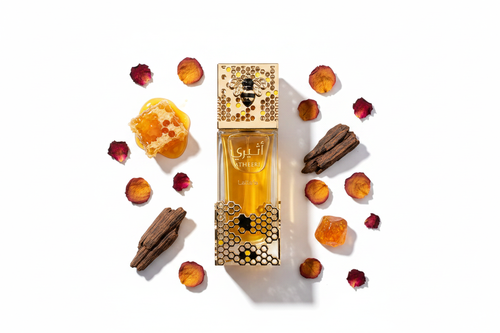 Frasco Eau de Parfum Lattafa Atheeri 100 ml con tapa y diseño dorado